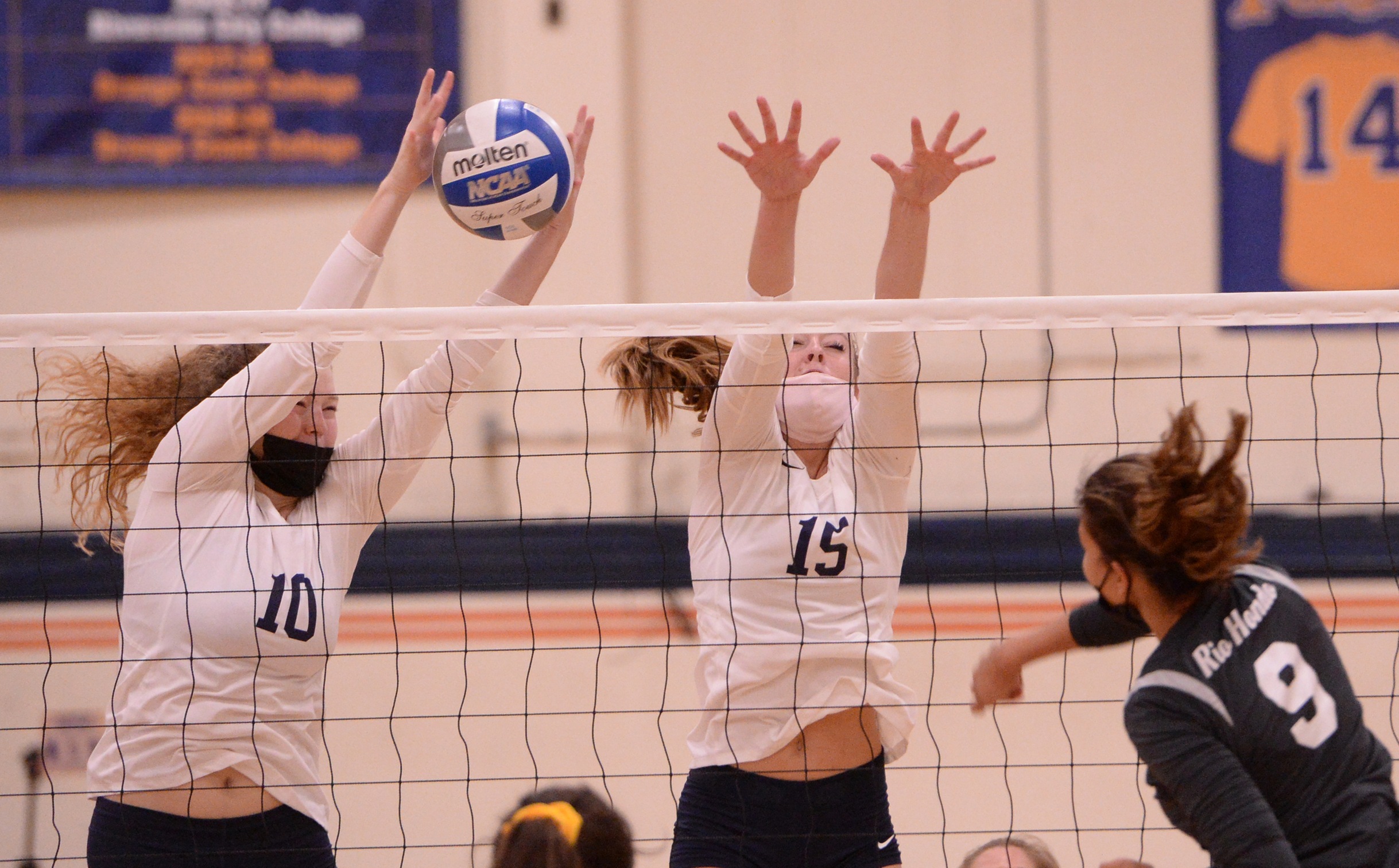 Coast claims two four-set wins